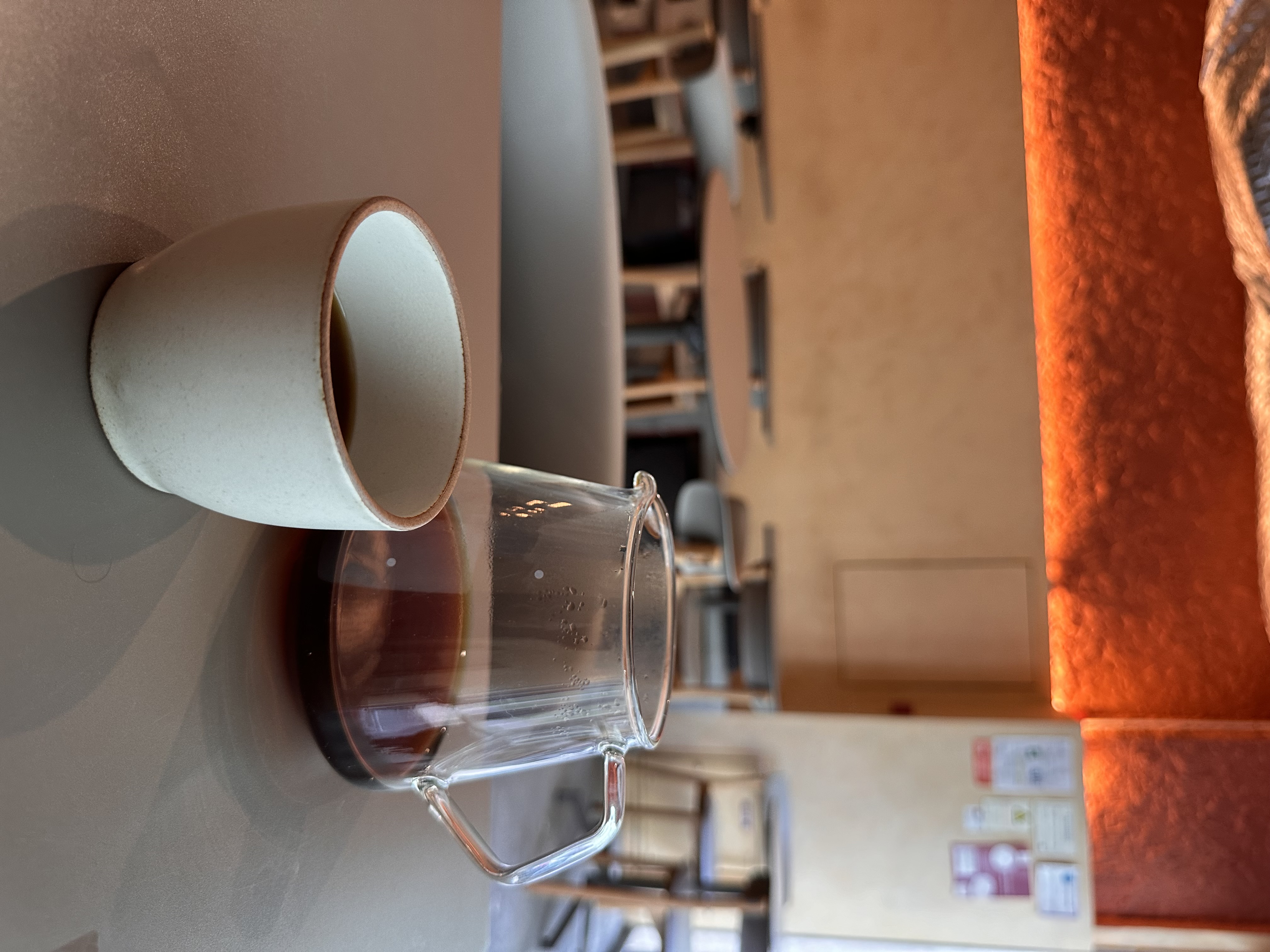 Coffee pitcher and a cup
